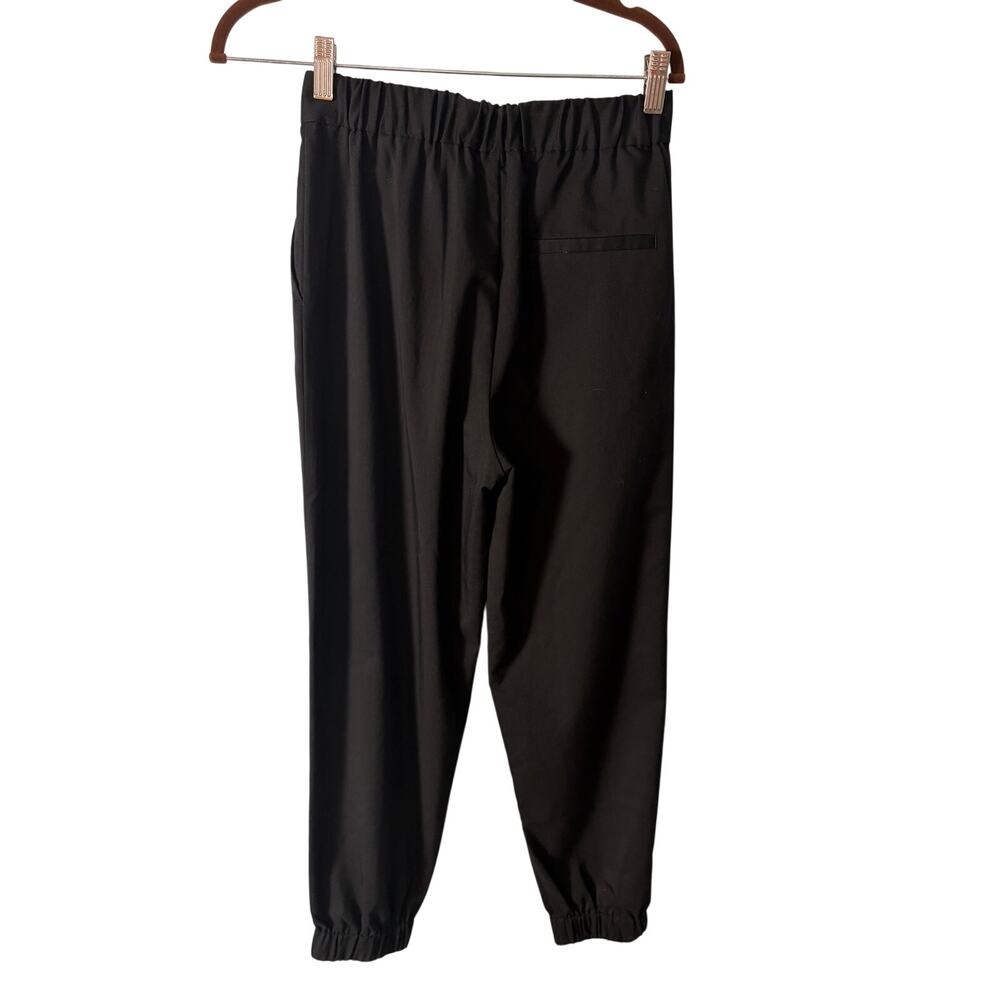 Mo&Co. Black Tailored Jogger Pants S Pleated Tapered Elastic Cuff Minimalist